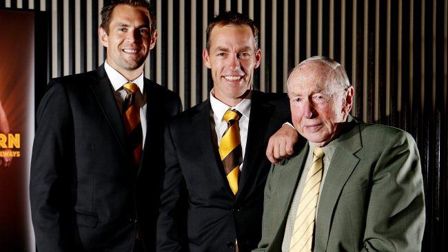 Hawthorn champion Luke Hodge and premiership mastermind Alastair Clarkson with club legend John Kennedy Sr.