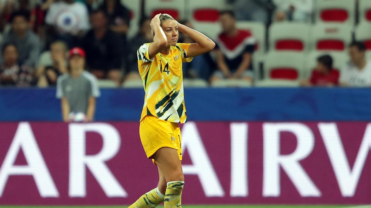 Alanna Kennedy of Australia leaves the pitch after receiving a red card. (Photo by Richard Heathcote/Getty Images)