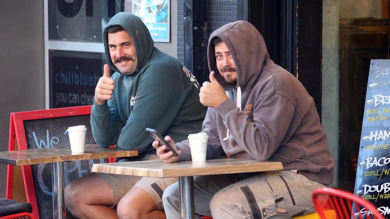 Patrons enjoying a coffee as cafes re-open in Kings Cross and Potts Point.