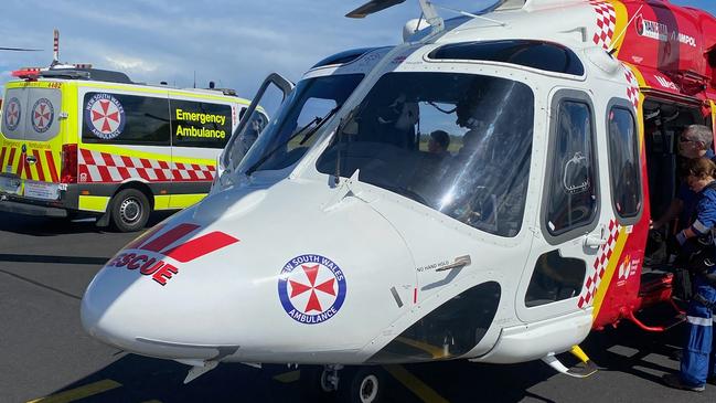 Westpac Rescue Helicopter at Coffs Harbour Airport where they met NSW Ambulance to fly a man in his 20s to the Gold Coast University Hospital on Wednesday.