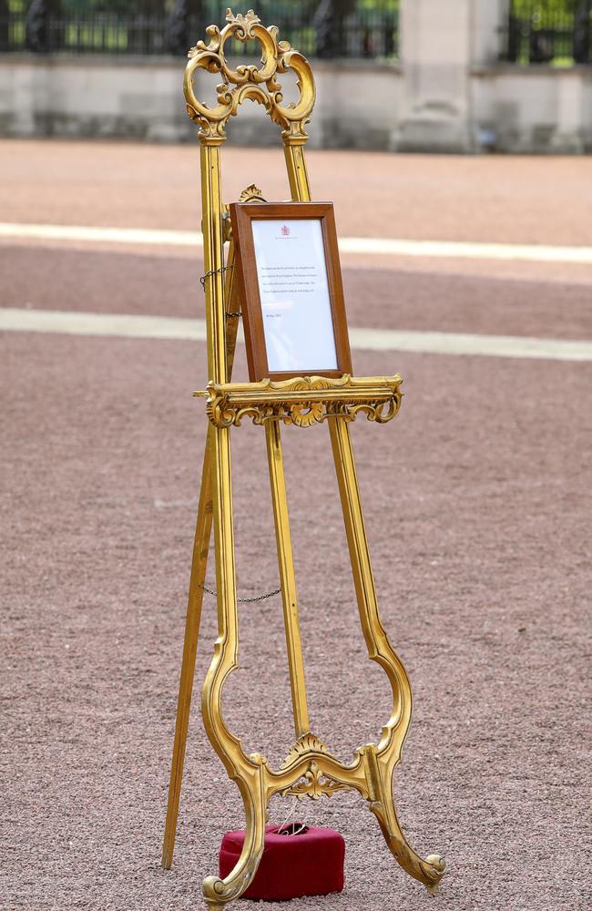 A notice is set on an easel in the forecourt of Buckingham Palace in London to formally announce the birth of a baby boy to Prince Harry and Meghan, Duchess of Sussex. Picture: AP Photo/Vudi Xhymshiti