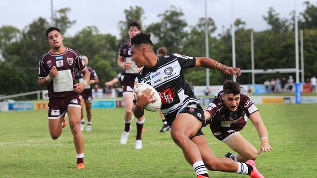 Tweed’s Keano Kini scoring for Seagulls last season.Picture: Scott Powick Newscorp