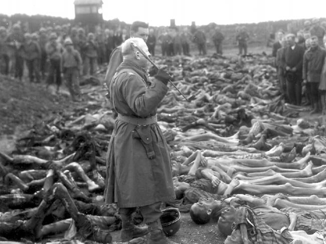 Unnamed USA colonel inspects Belsen death camp after liberation. Picture AP