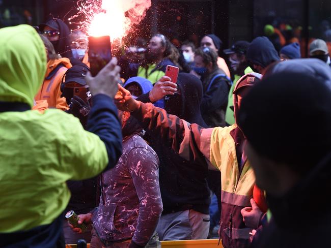 MELBOURNE, AUSTRALIA - NewsWire Photos SEPTEMBER 21, 2021: Protestors outside the Queen Victoria Market in Melbourne after yesterday's violent protests outside the CFMEU against mandatory vaccinations for workers on building sites. Picture: NCA NewsWire / Andrew Henshaw