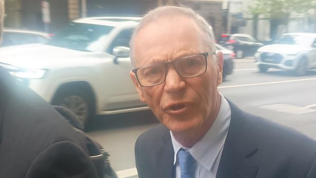 Former professor of neurosurgery Andrew Kaye, 74, leaves the Victorian Civil and Administrative Tribunal, where he has been accused of making an inappropriate sexual advance against a young female doctor.