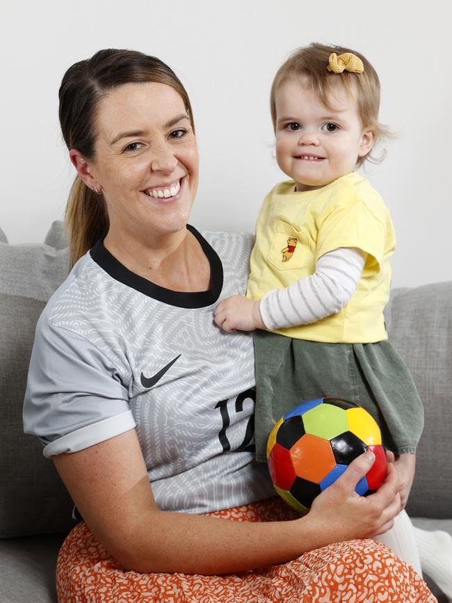 Caitlin Redmayne and daughter Poppy. Picture: Jonathan Ng