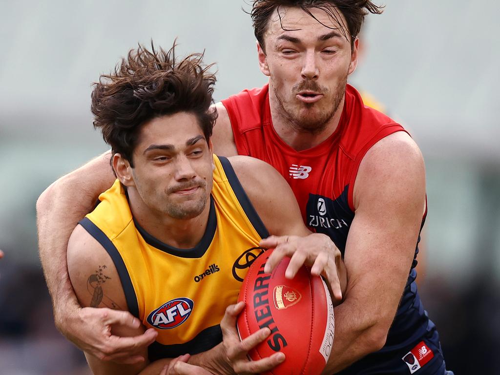 Michael Hibberd wraps up Crows forward Shane McAdam. Picture: Michael Klein