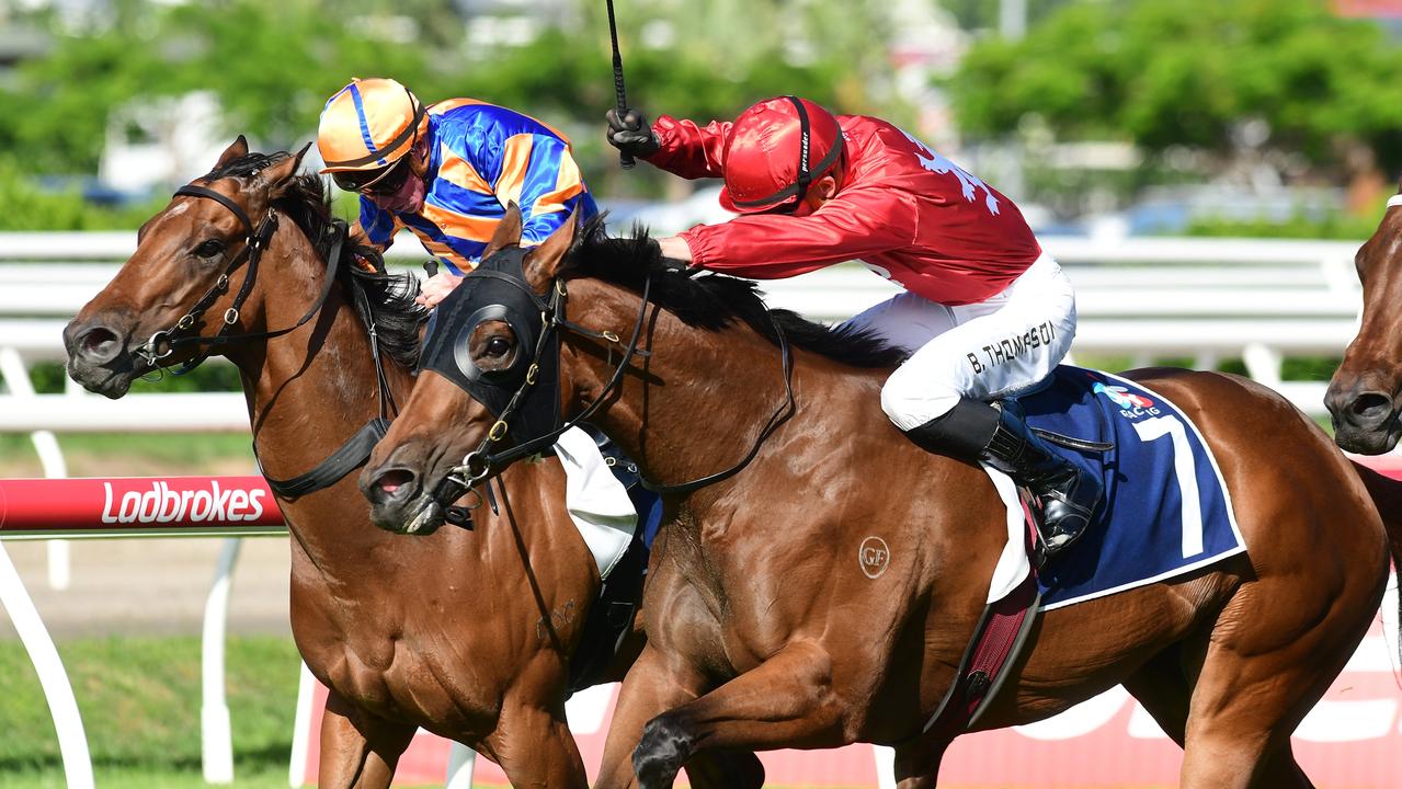 Supplied Editorial Tony Gollan-trained mare Sneaky Five (red colours) wins the Listed
 Bribie Handicap at Eagle Farm under jockey Ben Thompson. Picture credit:
 Natasha Wood, Trackside Photography.