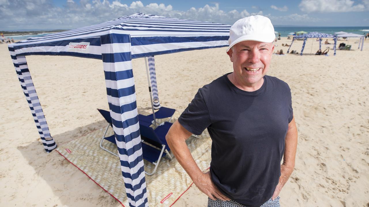 Queensland architect Mark Fraser who created the Cool Cabana beach umbrella on Noosa Main Beach. Picture: Lachie Millard