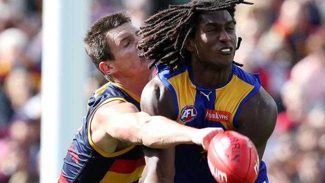 Thompson defends former West Coast superstar Nic Naitanui for the Crows. Picture: Sarah Reed