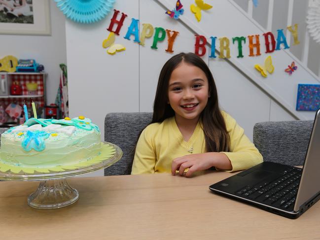 Birthday girl Zara, 9, has her birthday with friends and family via zoom at Mascot in Sydney. Picture: Gaye Gerard