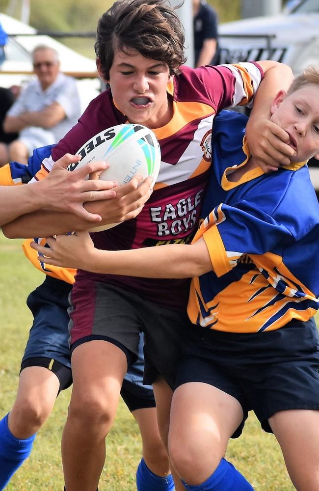 AUGUST 2021: Josh Venables of the Ingham State High School U13s is stopped from scoring close to the line. Photograph: Cameron Bates