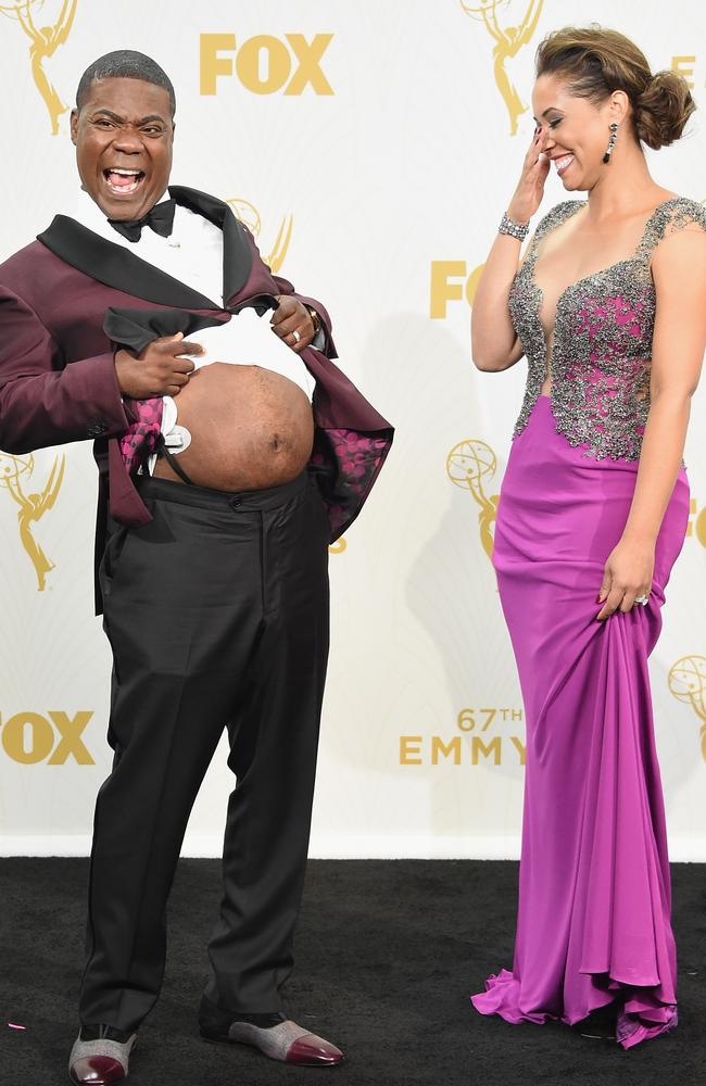 Tracy Morgan hams it up in the press room with wife Megan Wollover.