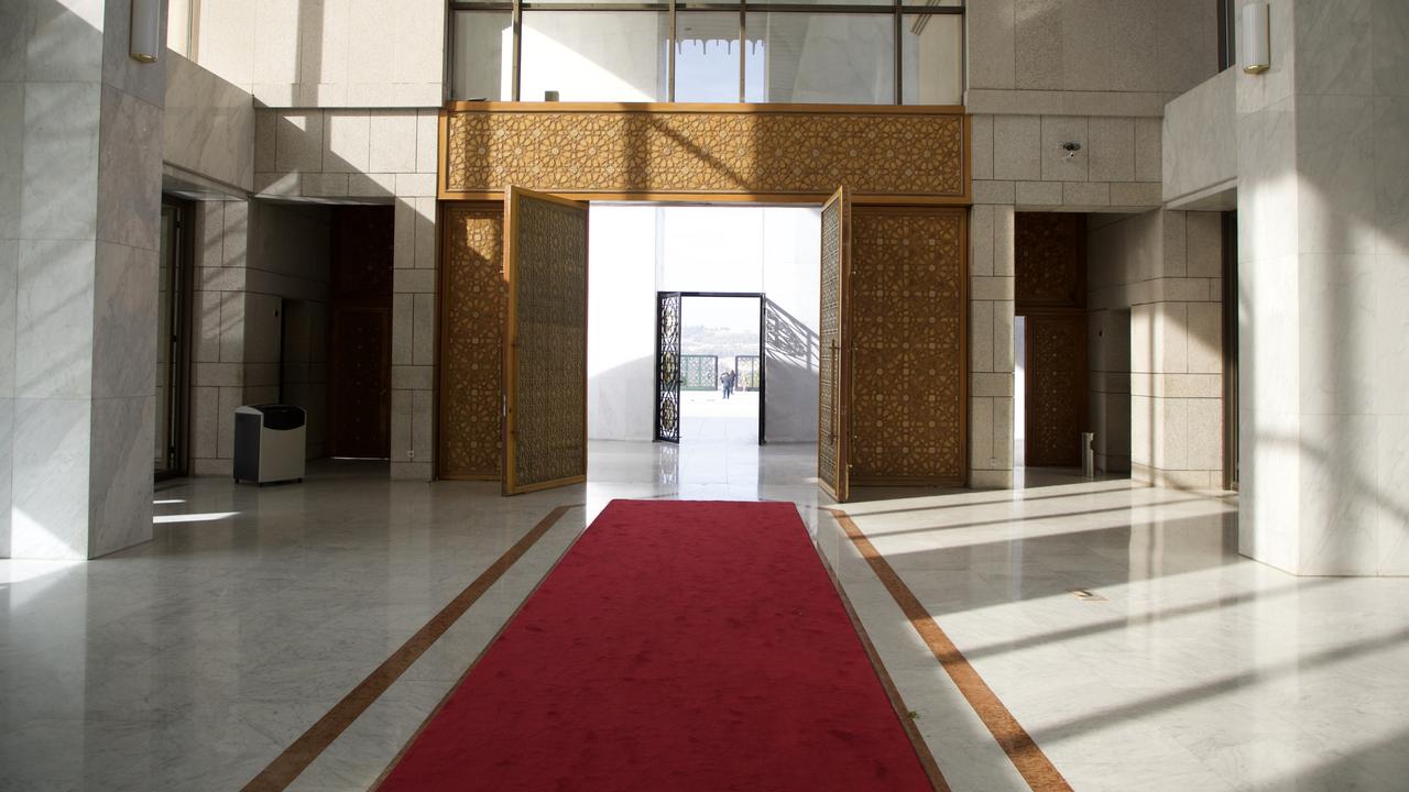 A passageway with a red carpet is seen inside the Presidential Palace. Picture: Getty