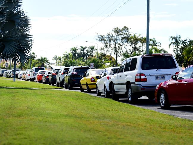 Vehicles line up outside the COVID-19 Testing Clinic in Kirwan, Townsville. Picture: Alix Sweeney