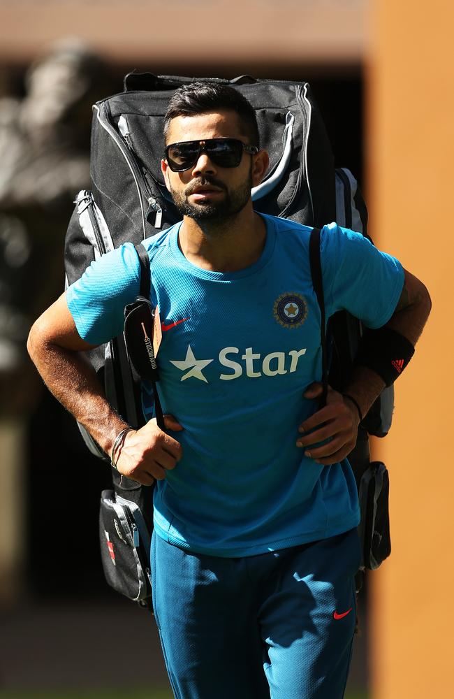 Virat Kohli heads to training at the SCG.