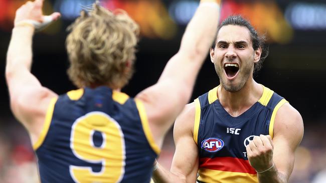 Troy Menzel celebrates his first goal as a Crow with Rory Sloane. Picture: Sarah Reed