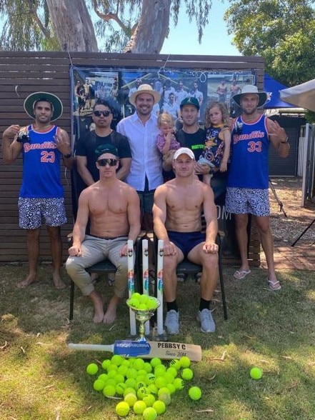 Adelaide's Brodie Smith and Rory Laird in their annual backyard cricket competition on Boxing Day.