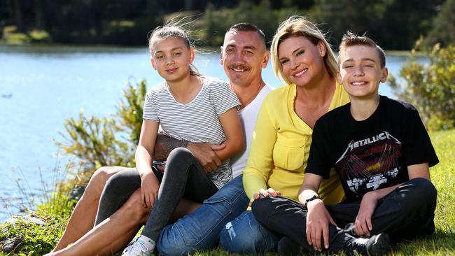 Mat Rogers with wife Chloe Maxwell and children Max and Phoenix. Picture: Adam Head