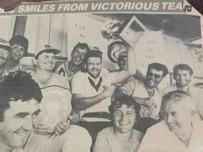 Melcom Cross (glasses) pictured in a Rockhampton Morning Bulletin story in 1986 with cricketing mates after a victory.