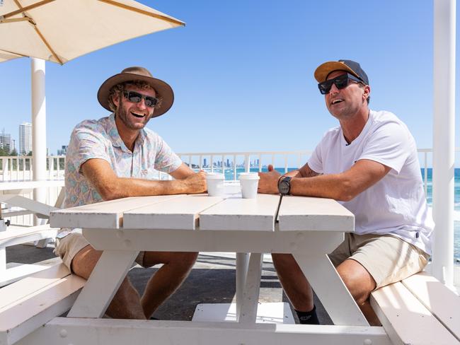 Surfers Jay Thompson (left) and Joel Parkinson discuss the new layout for the 2024 Australian Boardriders Battle at Burleigh Heads. Picture: Andy Morris/Surfing Australia