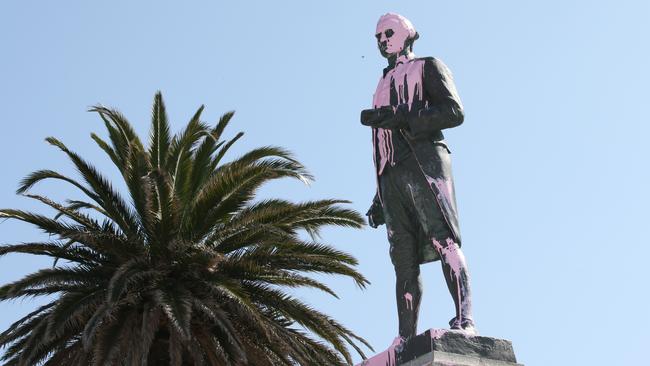 Pink paint covering the head of the James Cook statue in St Kilda last year. Picture: AAP Image/David Crosling