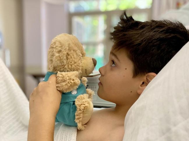 Elias Carrera, 11, recovering in hospital after surgery for injuries caused by a firework hitting his chest at a Christmas carols event. Picture: Carrera family