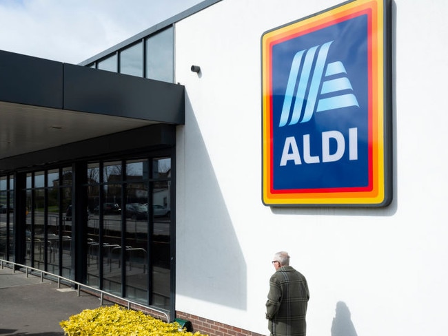 An elderly man passes the brand's logo on his way into the shop, as German grocery giant Aldi announces that the prices of goods in its supermarkets will rise by as much as 50% in its home country due to Russia's invasion of Ukraine on 5th April, 2022 in Leeds, United Kingdom. The German supermarket chain has cited the rising costs of production and distribution costs due to the war in Ukraine as a cause for price hikes. (photo by Daniel Harvey Gonzalez/In Pictures via Getty Images)