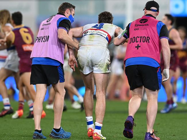 Bontempelli was helped from the field on Saturday night. Picture: Bradley Kanaris/Getty Images