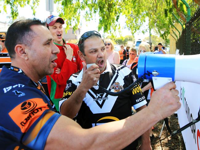 Tigers fans chant at a rally to support Robbie Farah, sacked by the Wests Tigers, outside Concord Oval. pic Mark Evans