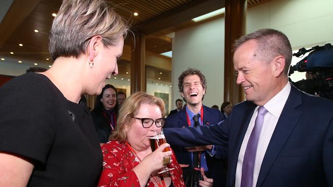 Tanya Plibersek and Bill Shorten congratulate activist and actor Magda Szubanski after the Same Sex Marriage Bill passes.