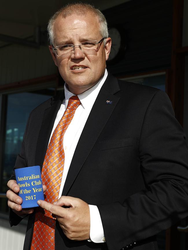 Scott Morrison and the election stubby holder Picture: Getty Images