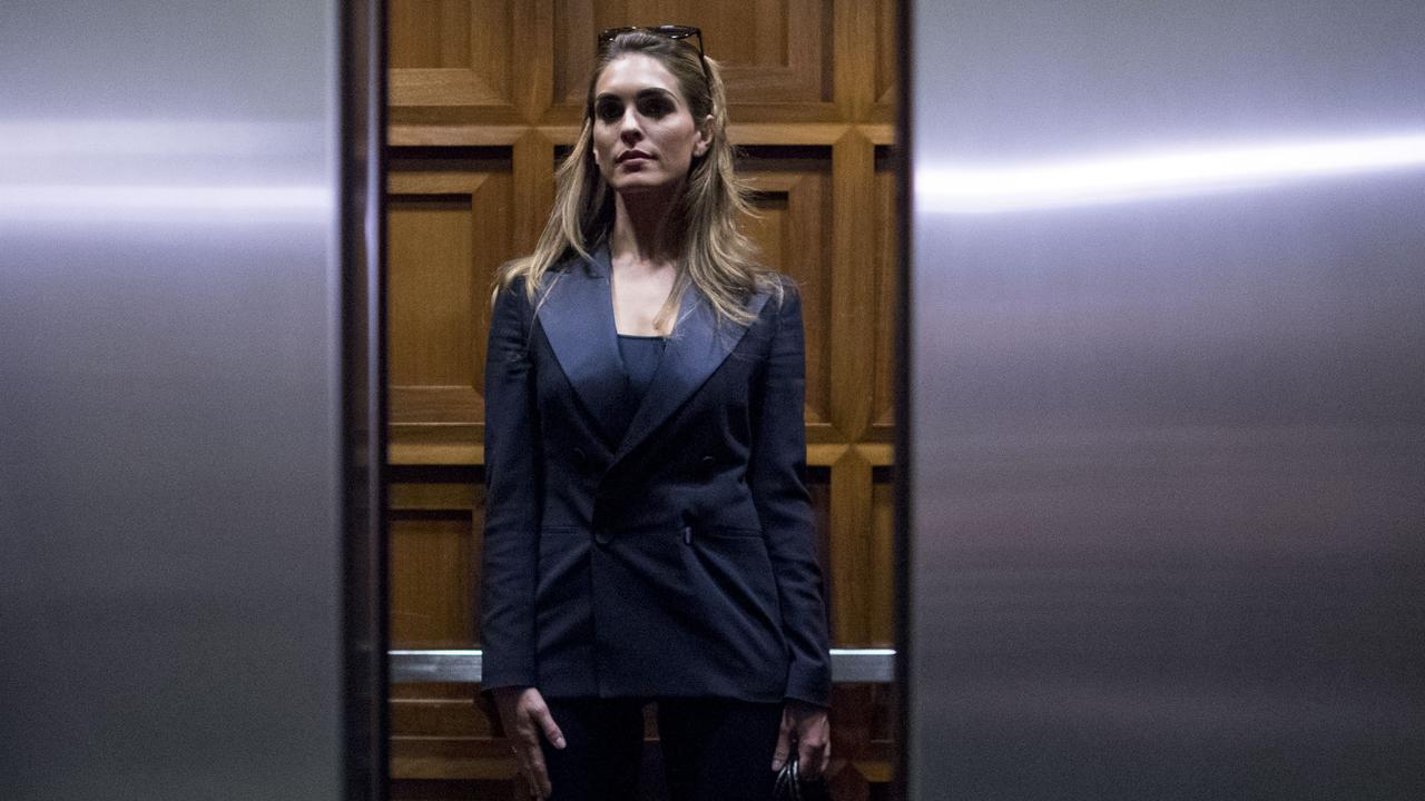 Hope Hicks leaving following the interview. Picture: AP