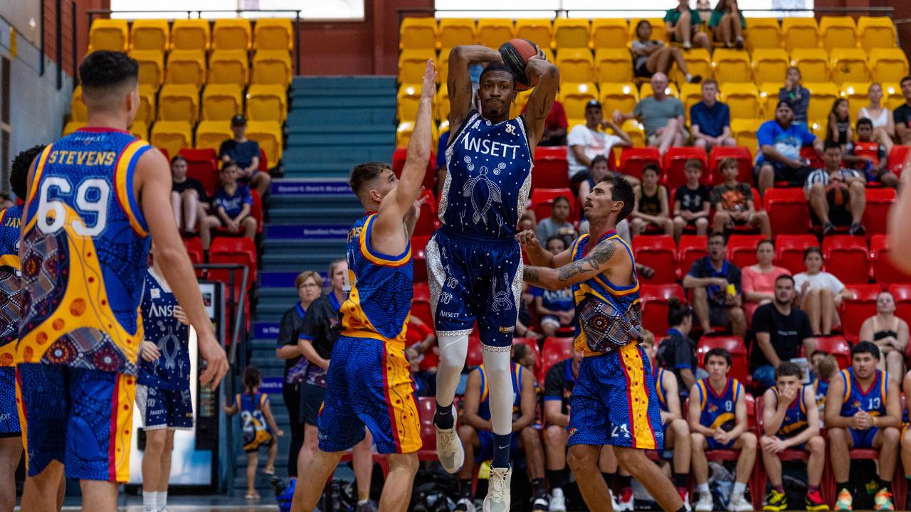 Fred Williams from Ansett passes the ball. Darwin Basketball Men's Championship Round 20: Ansett v Tracy Village Jets. Picture: Che Chorley