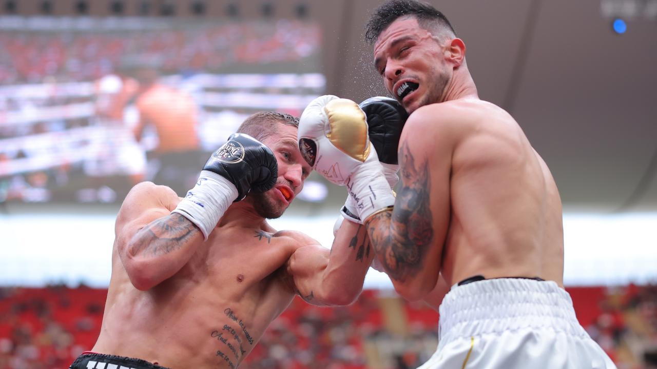 ZAPOPAN, MEXICO – MAY 06: Steve Spark of Australia punches Gabriel Gollaz of Mexico during the fight for the WBA Inter-Continental Super Light title at Akron Stadium on May 06, 2023 in Zapopan, Mexico. (Photo by Hector Vivas/Getty Images)
