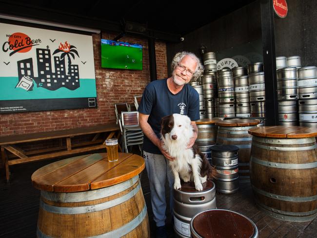 Alistair Carragher, pictured with his dog Bozo, owns the Great Northern Hotel in Carlton North and has been inundated with bookings for Grand Final Day. However, whether he will be able to open for the busiest day of the year remains unknown until Premier Daniel Andrews updates Victorians on Sunday.Photograph by Paul JeffersThe Australian16 Oct 2020