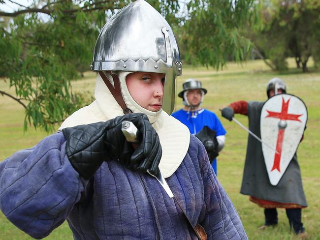 Sarah Dahlhaus and fellow Geelong Crusaders who are a combat re-enactment group that strives to preserve the heritage of the crusading periods from all cultures (11th to 13th Century). They hold training sessions every Sunday @ Fyansford Common, which involves practising with swords, axes, spears, daggers, that sort of thing. Pictrure: Alan Barber