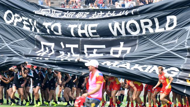 Port Adelaide runs out for its China match in 2017.