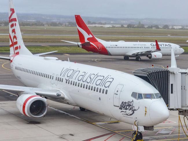 ADELAIDE, AUSTRALIA - NewsWire Photos SEPTEMBER 22, 2021: Virgin, Qantas and Cobham aircraft at Adelaide Airport. Picture: NCA NewsWire /Brenton Edwards