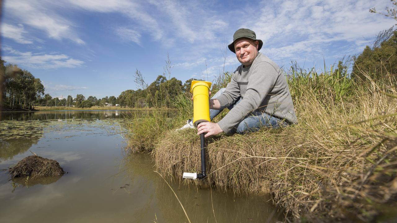 Logan City Council have provided an enviroGrant for a SEMAT deployment at Lake Ellerslie, Griffith Logan Campus.  Thurssday, June 14 2018. Co-creator of SEMAT Dr. Jarrod Trevathan poses for a photograph at Lake Ellerslie.   (AAP Image/Renae Droop)