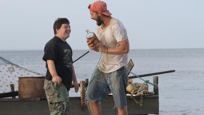 Shia LaBouef and Zack Gottsagen in The Peanut Butter Falcon.