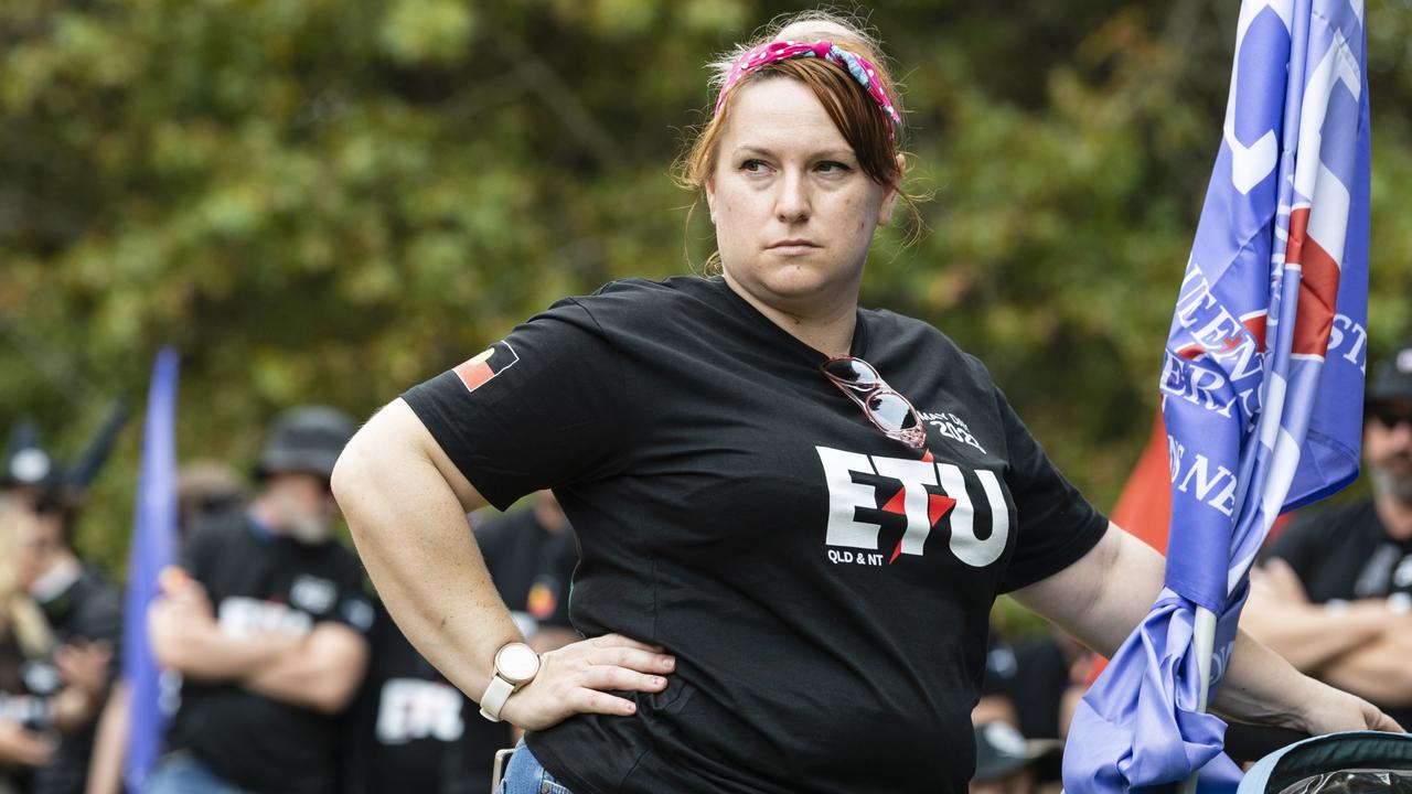 ETU member Mel Street listens to the speakers before the Toowoomba Labour Day march, Saturday, April 29, 2023. Picture: Kevin Farmer