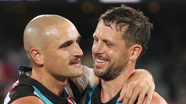 ADELAIDE, AUSTRALIA - SEPTEMBER 16: Sam Powell-Pepper of the Power with Travis Boak after the match during the 2023 AFL Second Semi Final match between the Port Adelaide Power and the GWS GIANTS at Adelaide Oval on September 16, 2023 in Adelaide, Australia. (Photo by Sarah Reed/AFL Photos via Getty Images)