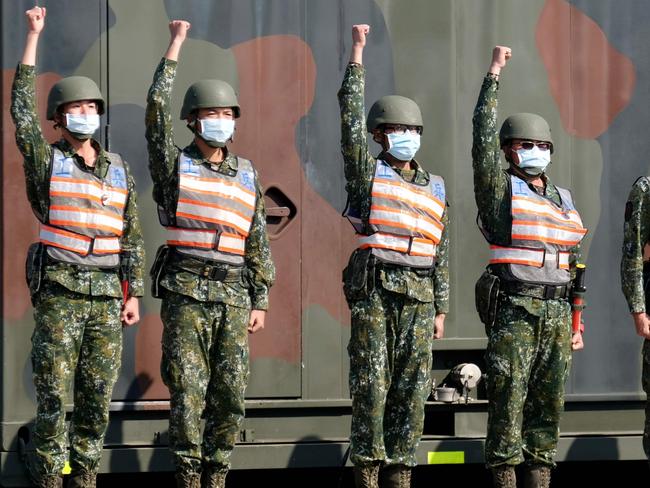 Taiwan's chemical corps personnel stand in formation during a demonstration as Taiwan's President Tsai Ing-wen inspects troops. Picture: Sam Yeh