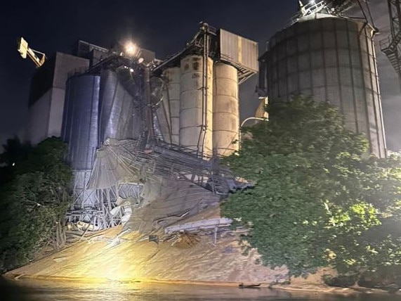 Dozens evacuated after two silos collapse, third at risk