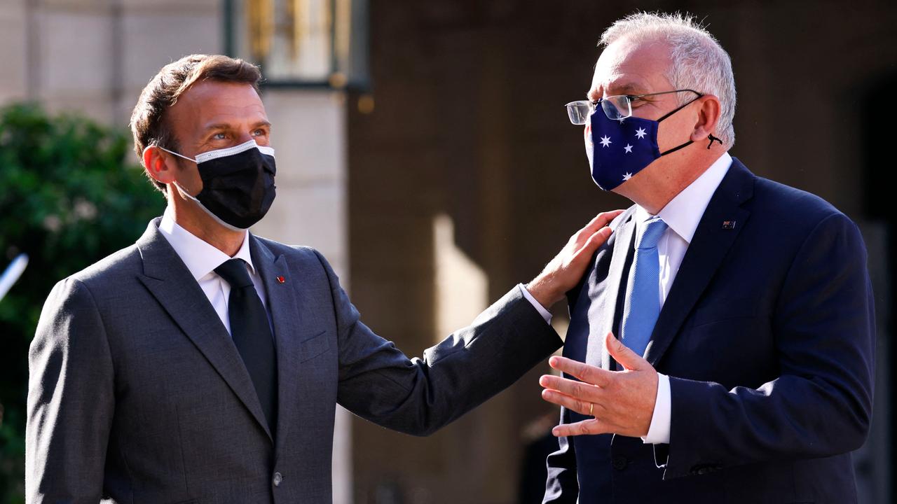 French President Emmanuel Macron greets Australia's Prime Minister Scott Morrison at the Elysee Palace in Paris in June before the relationship soured with Australia’s scrapping of the French submarine deal. Picture: Thomas SAMSON / AFP