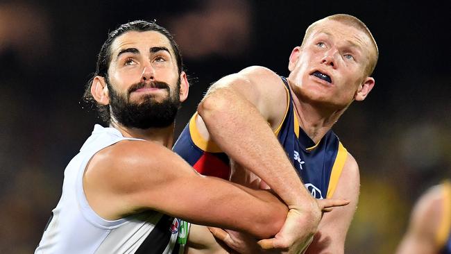 Brodie Grundy up against Crows veteran Sam Jacobs at Adelaide Oval. Picture: Daniel Kalisz/Getty Images