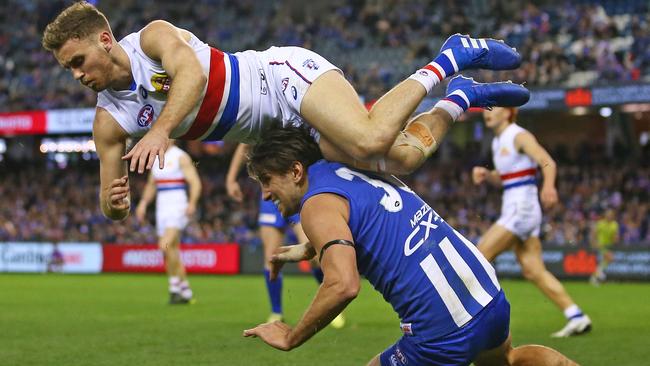 North forward Jarrad Waite crashes heavily into Hayden Crozier. Picture: Getty Images