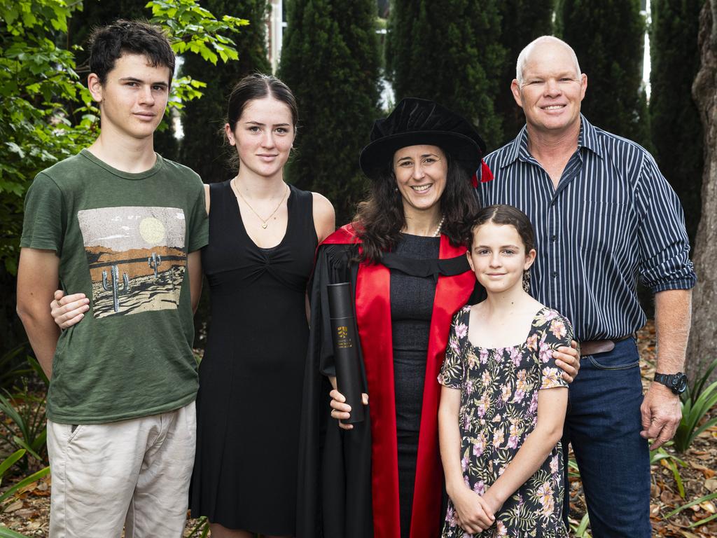 PhD graduate Aurelie Quade with kids (from left) Leo, Automne and Cevennes Quade and partner Justin Sutherland at a UniSQ graduation ceremony at The Empire, Wednesday, October 30, 2024. Picture: Kevin Farmer