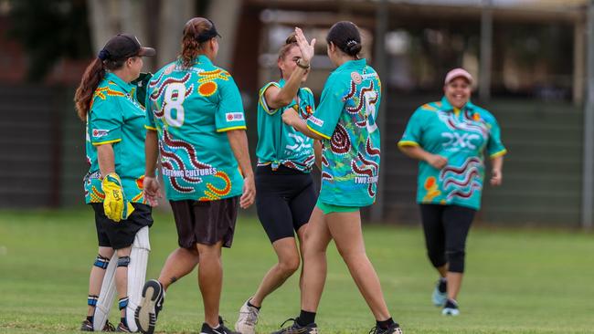 One of the women’s sides celebrating a wicket. Picture: Charlie Lowson/NT Cricket.